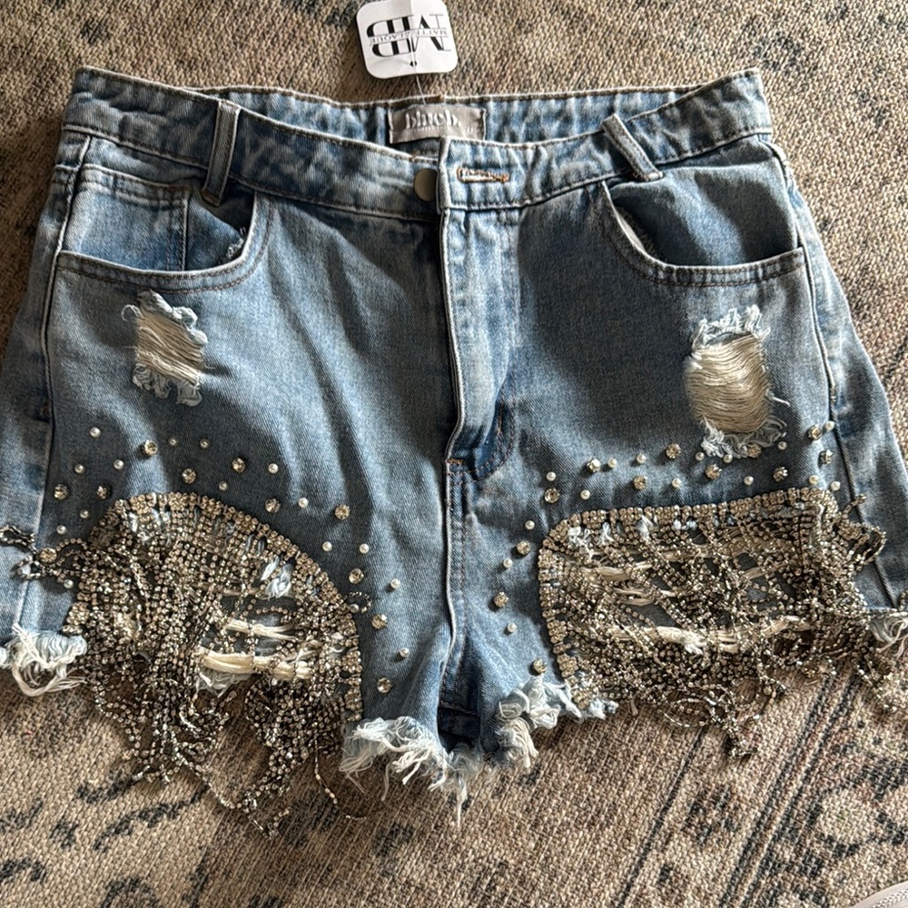 Blue High-Waisted Jean Shorts with Distressed Details